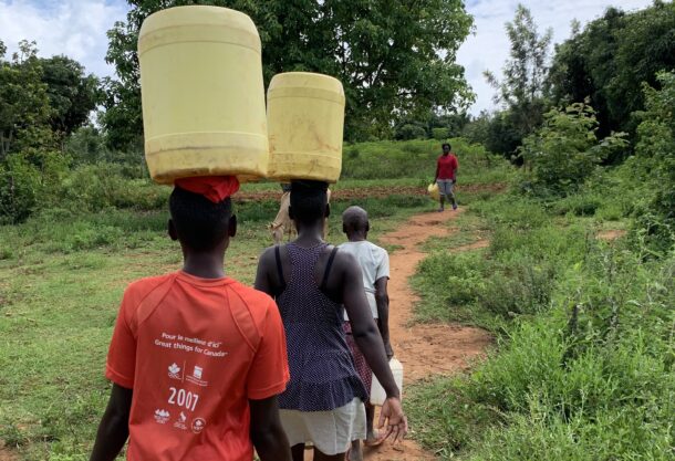 International Women's Day - Women Walking with Jerrycans